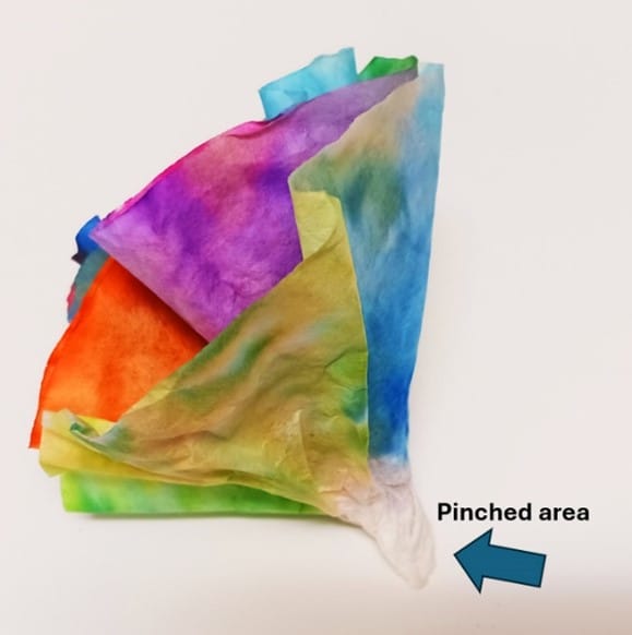 3 colorful coffee filter flowers grouped together