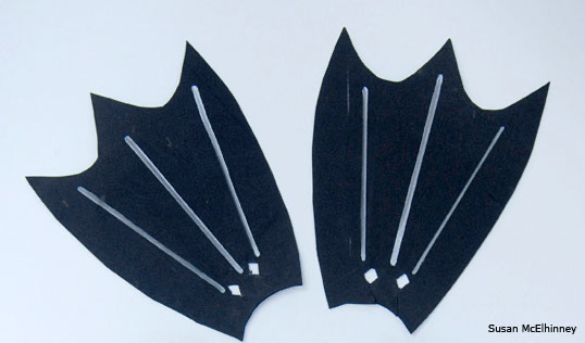 Pair of black craft foam loon webbed feet for a bird costume
