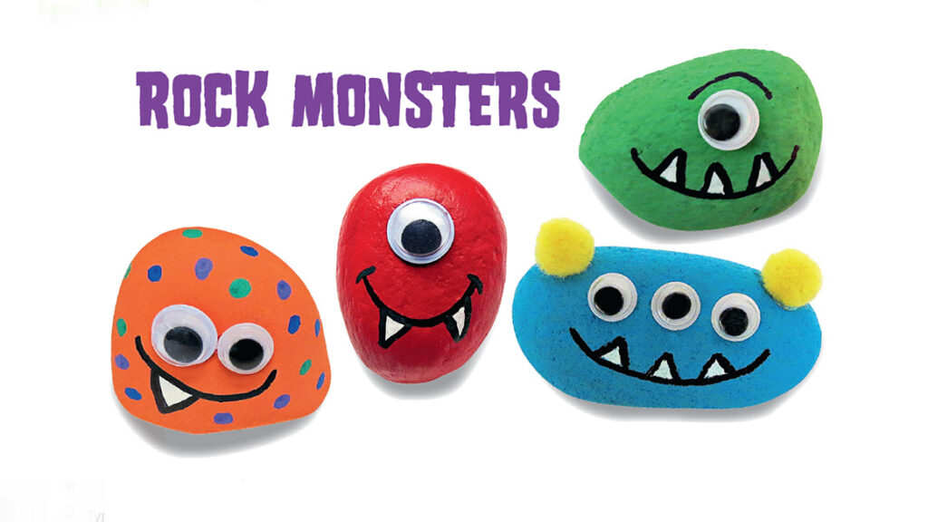 Four colorful painted rock monsters with googly eyes and toothy grins on white background